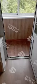 Холодное остекление балкона с отделкой Холодное остекление балкона с отделкой